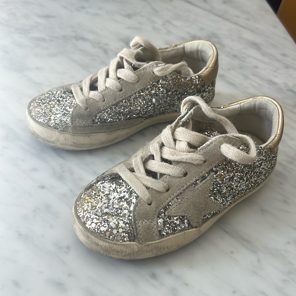 Very little worn toddle girl golden goose shoes .in perfect condition